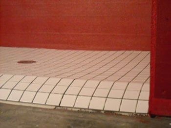 wheelchair accessible shower curb, handi kirb, shower curb, ready to tile curb, preformed shower curb, ready made curb, shower floor drainage kit