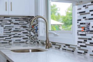 faucet-and-kitchen-faucet-and-countertop-details-scaled