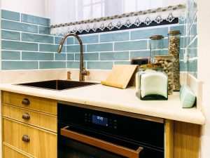glass-jars-with-ingredients-on-kitchen-counter-scaled