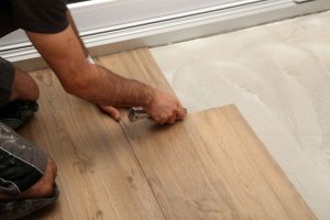 high-angle-shot-of-the-worker-installing-a-new-vinyl