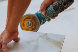 Industrial Tile Builder Worker Installing Floor