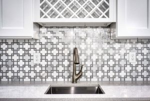 interior-of-a-modern-kitchen-with-a-golden-faucet-scaled