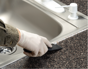 removing caulk on the sink