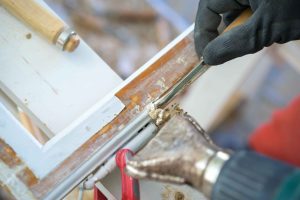 removing caulk window frame